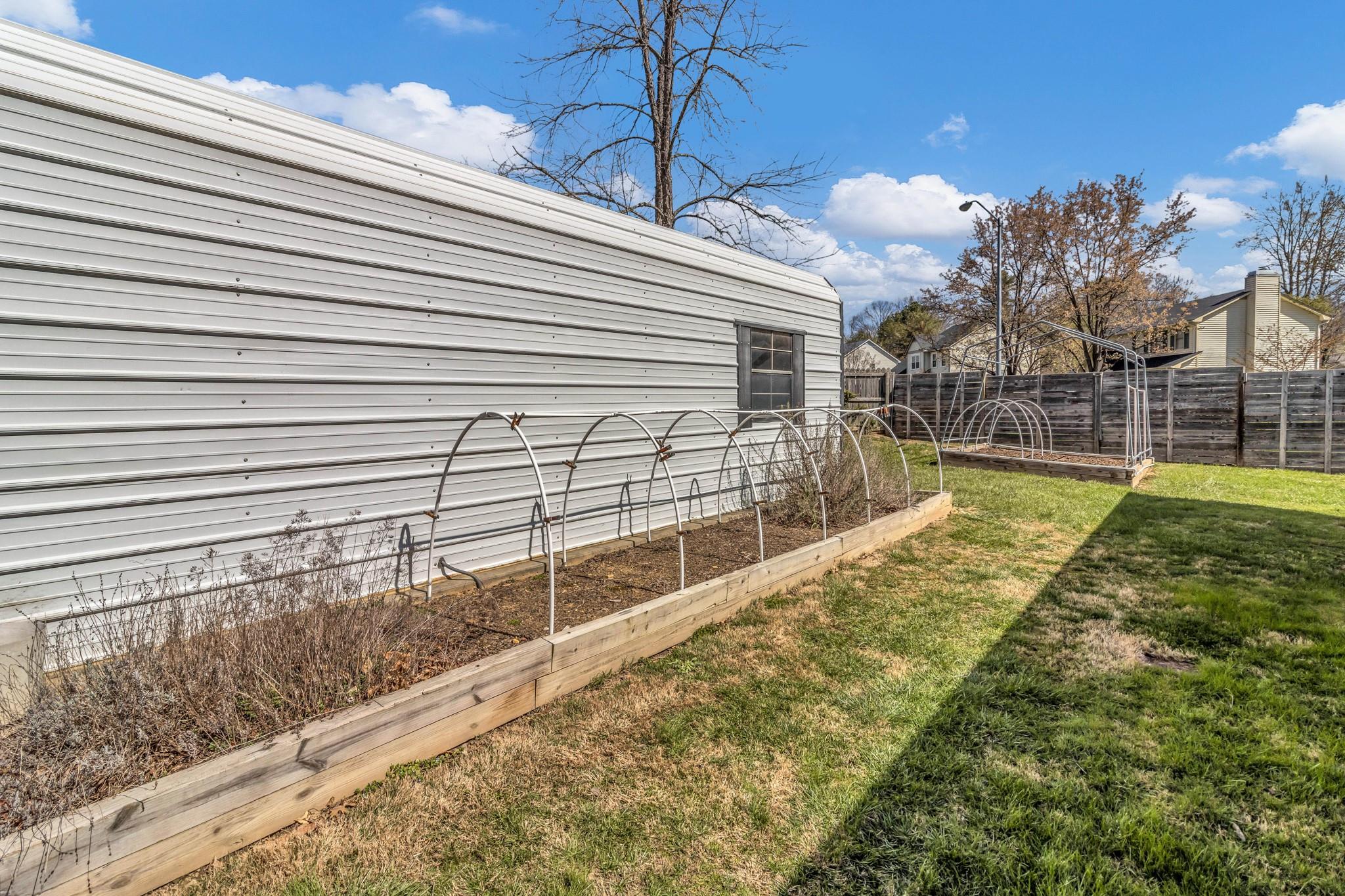 994 Riceville Road Asheville, NC 28805 - Photo 17 of 45 a view of a backyard with a swimming pool