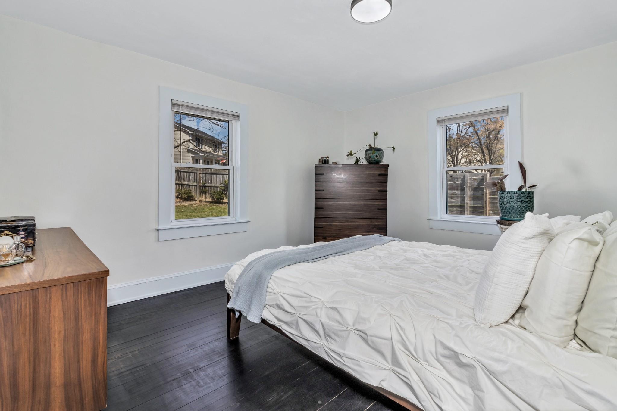 994 Riceville Road Asheville, NC 28805 - Photo 19 of 45 a bedroom with a bed and a window