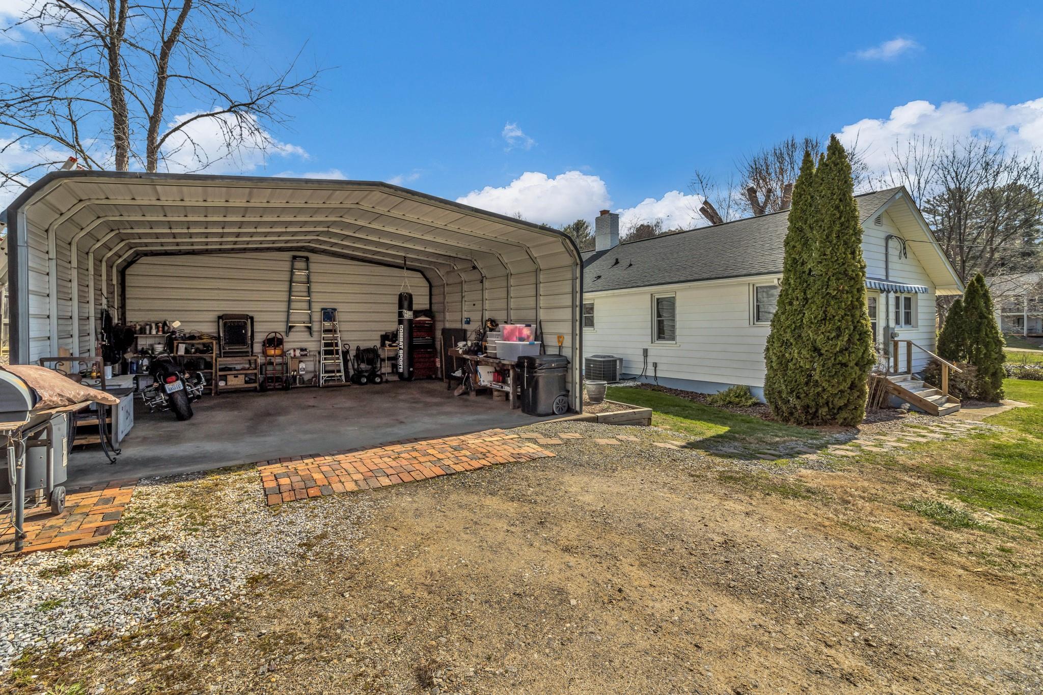 994 Riceville Road Asheville, NC 28805 - Photo 21 of 45 a view of a house with a outdoor space