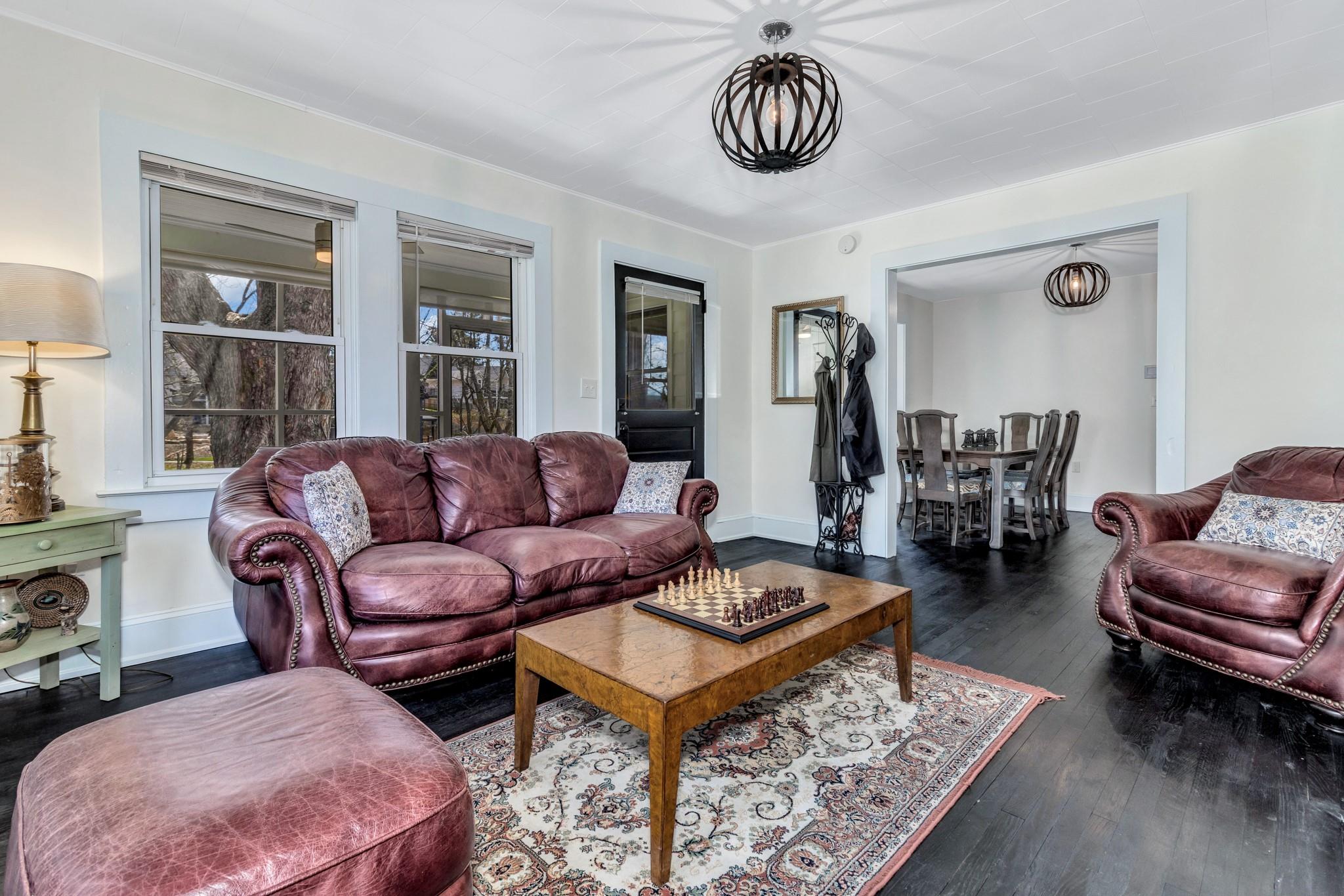 994 Riceville Road Asheville, NC 28805 - Photo 35 of 45 a living room with furniture a rug and a window