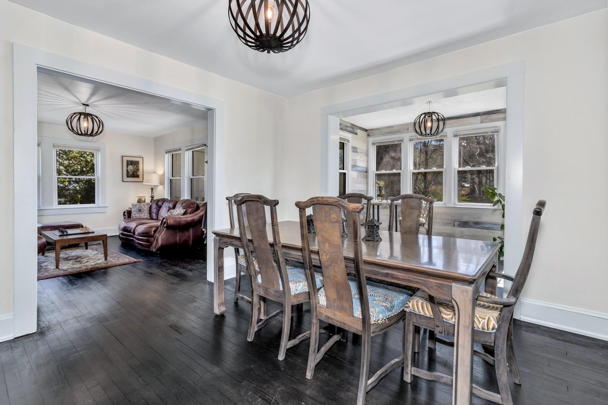 994 Riceville Road Asheville, NC 28805 - Photo 39 of 45 a view of a dining room with furniture and wooden floor