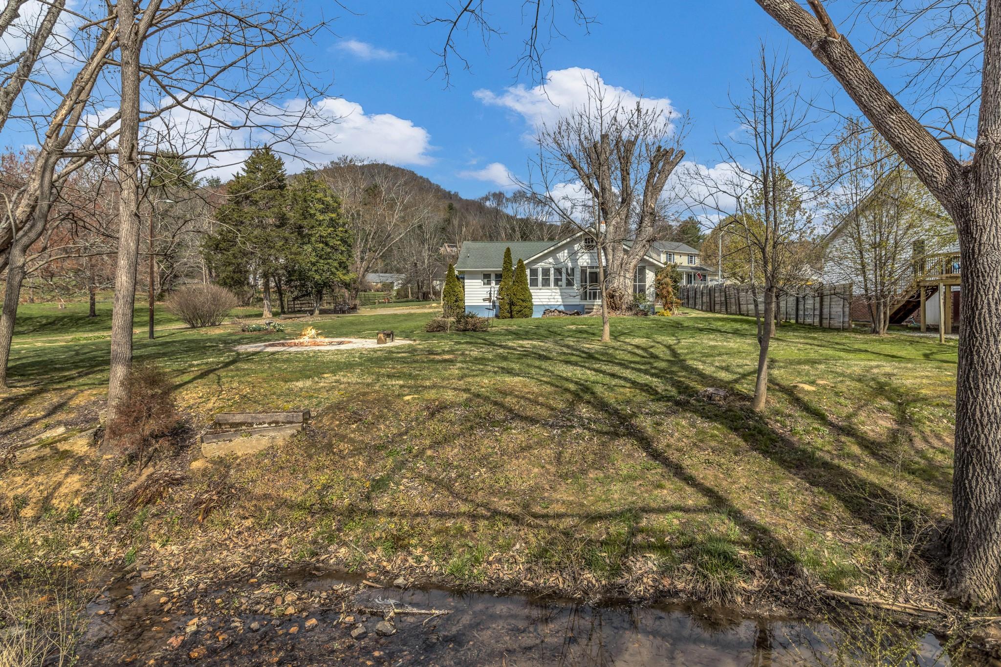 994 Riceville Road Asheville, NC 28805 - Photo 4 of 45 a view of a house with a yard