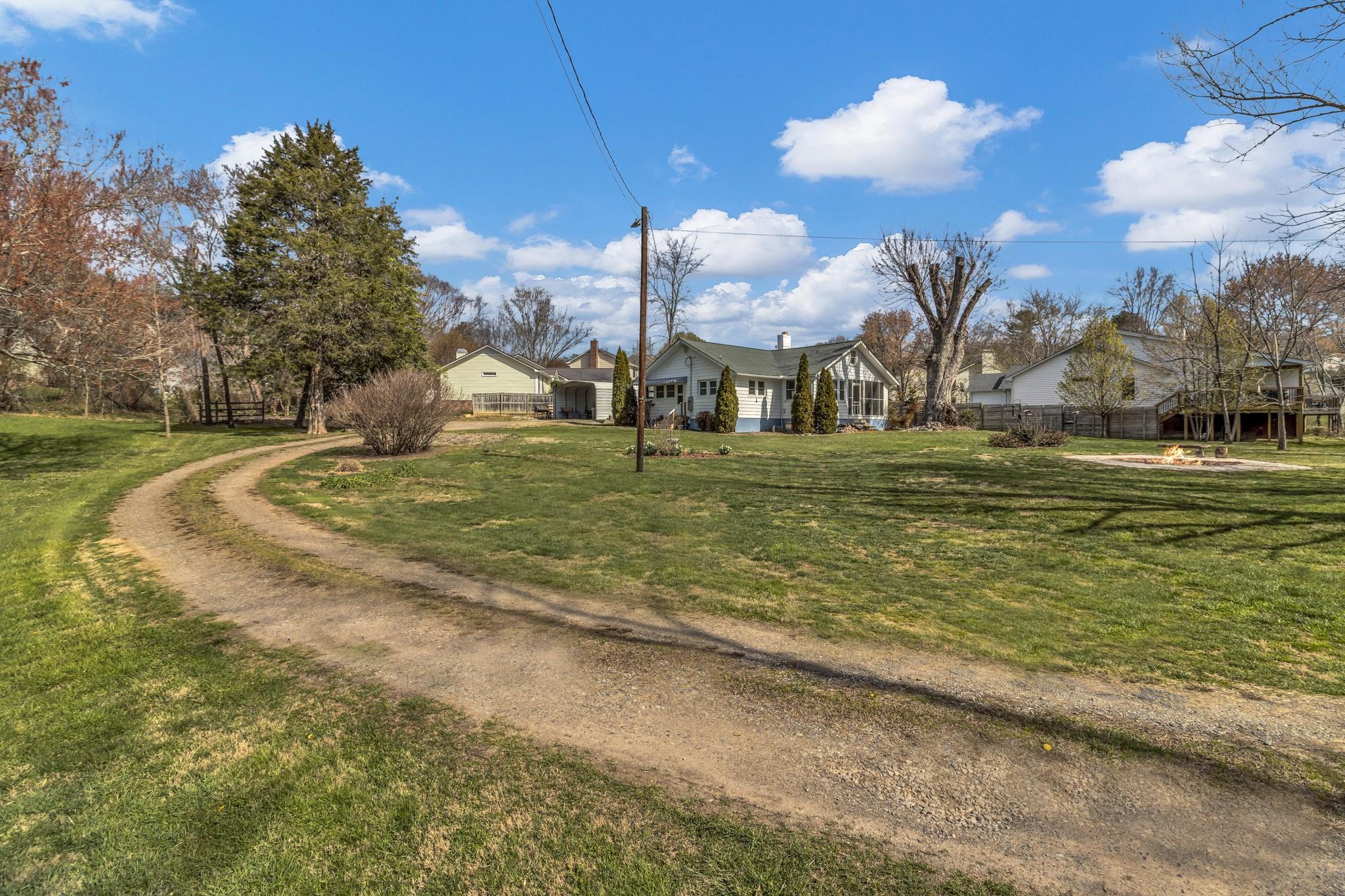 994 Riceville Road Asheville, NC 28805 - Photo 5 of 45 a large body of water with a building in the background