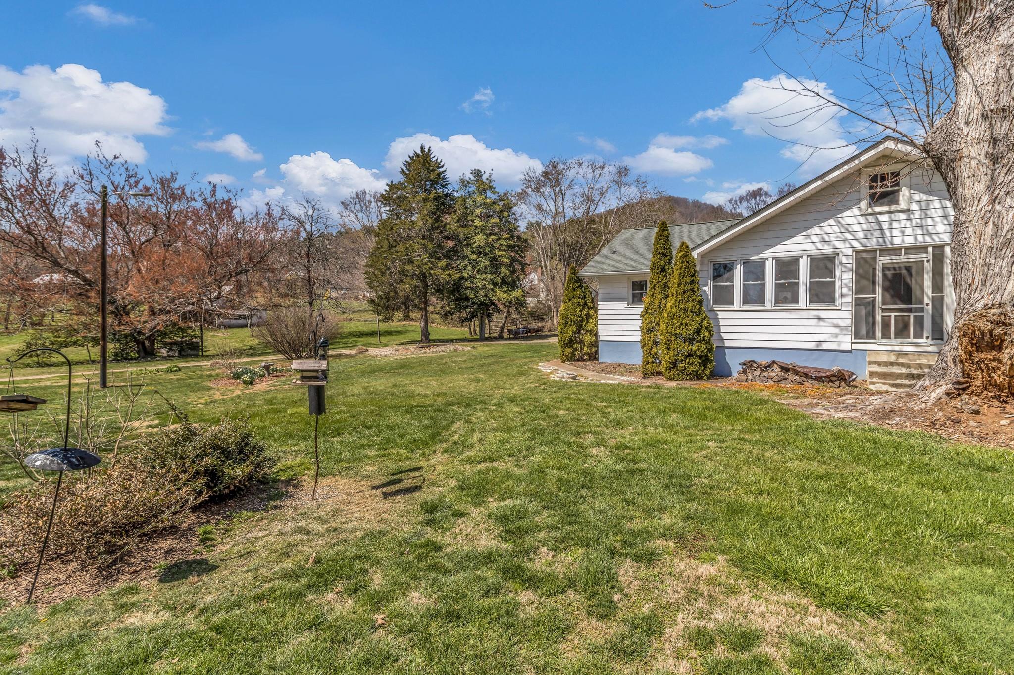 994 Riceville Road Asheville, NC 28805 - Photo 7 of 45 a front view of a house with garden