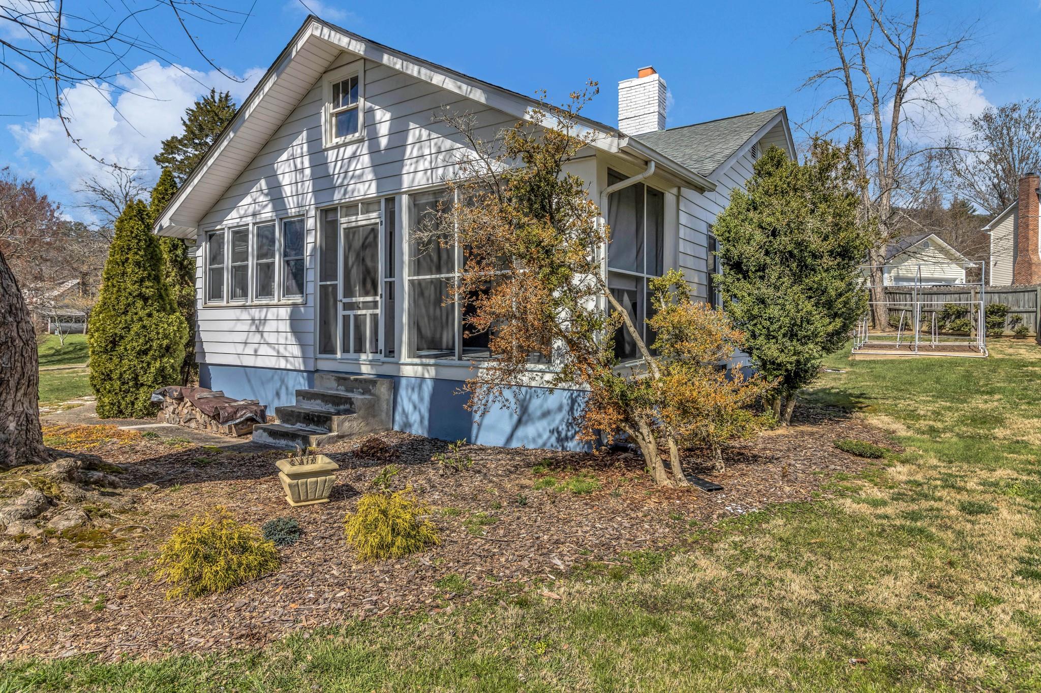 994 Riceville Road Asheville, NC 28805 - Photo 8 of 45 a view of a house with a yard