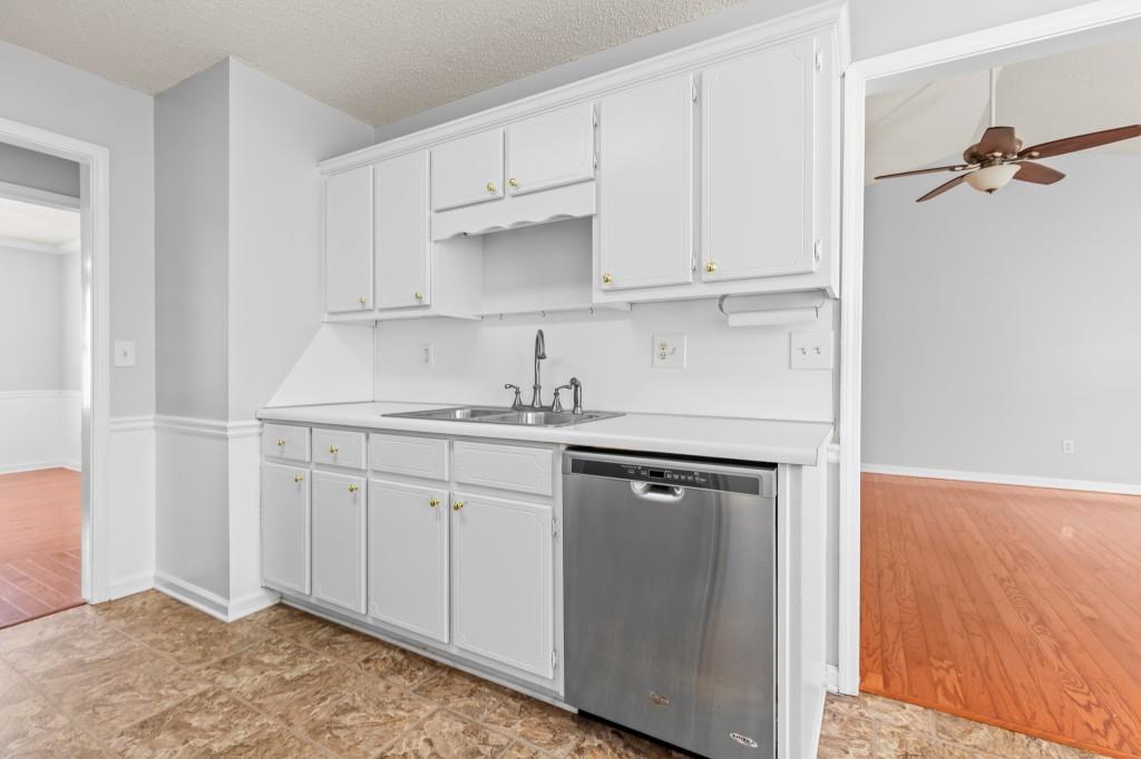 1707 Mountain Fort Way Dacula, GA 30019 - Photo 12 of 34 a kitchen with cabinets appliances and a window
