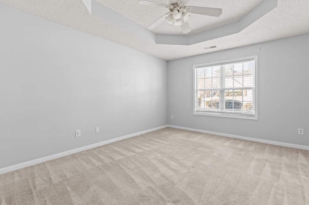 1707 Mountain Fort Way Dacula, GA 30019 - Photo 17 of 34 a view of an empty room with a window