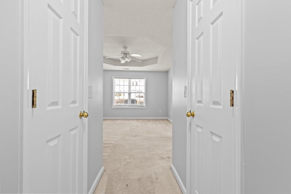 1707 Mountain Fort Way Dacula, GA 30019 - Photo 19 of 34 a bathroom with a sink toilet and shower