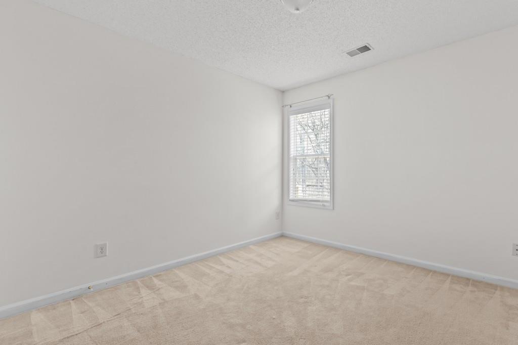 1707 Mountain Fort Way Dacula, GA 30019 - Photo 24 of 34 an empty room with a window