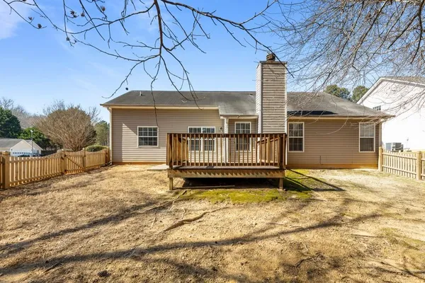 a balcony with wooden floor