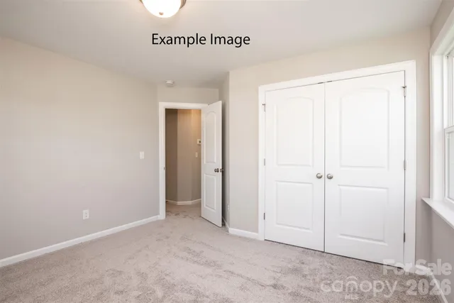 an empty room with a hallway