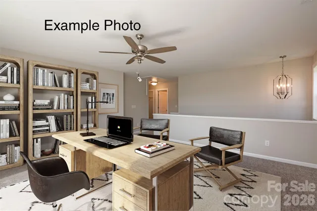 a workspace with furniture and bookshelf