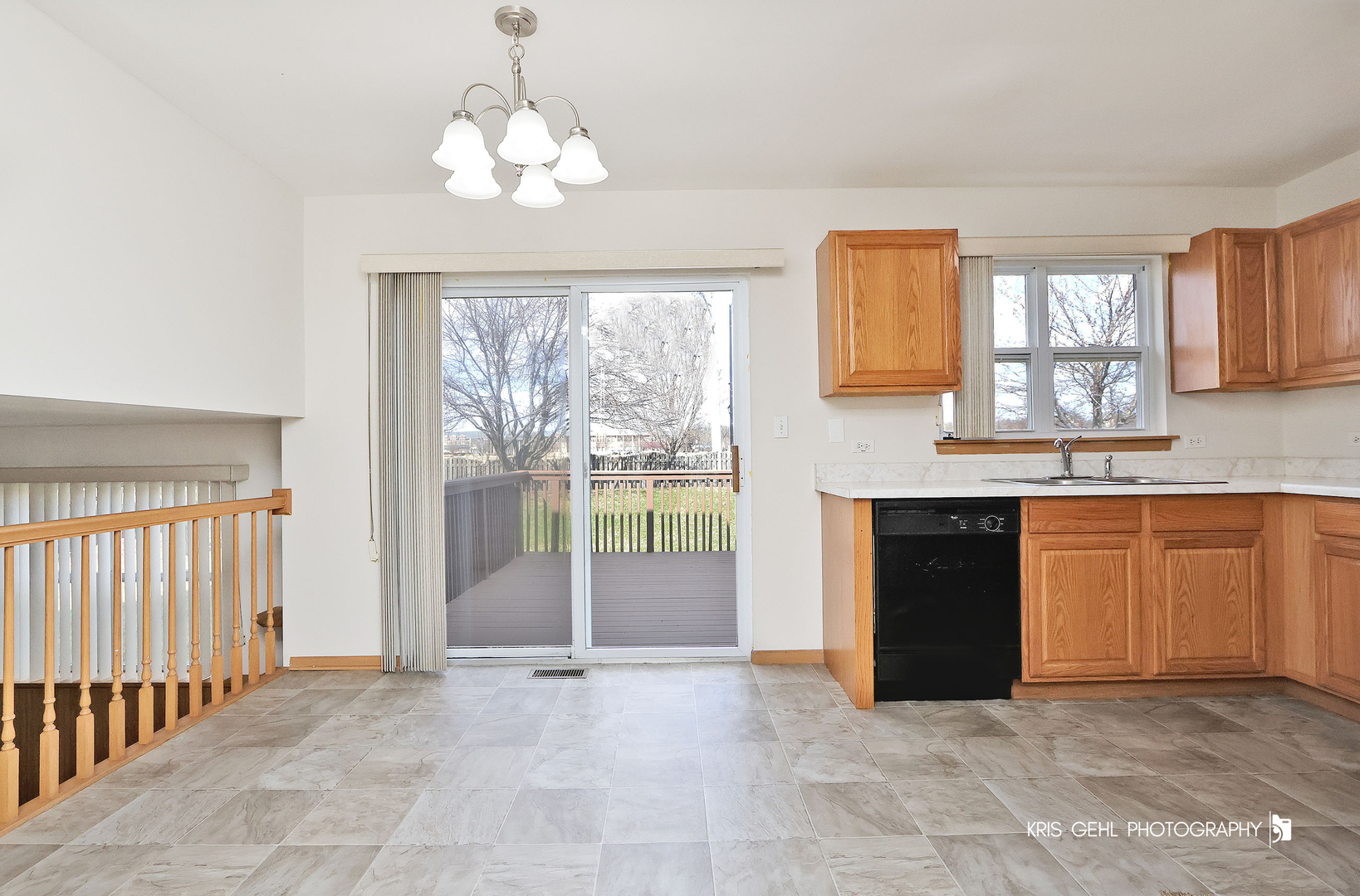 1038 Redondo Drive Romeoville, IL 60446 - Photo 5 of 23 a view of a kitchen with granite countertop a stove top oven a sink and dishwasher