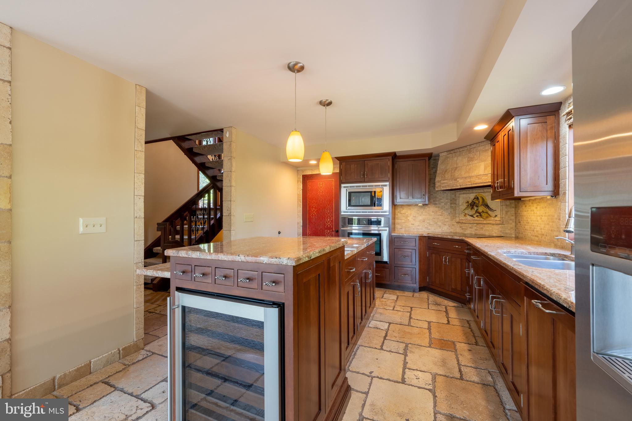 3446 Honeysuckle Road Bethlehem, PA 18015 - Photo 18 of 80 a kitchen with stainless steel appliances granite countertop a stove and a sink