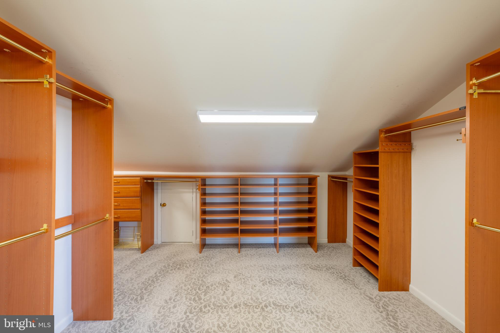 3446 Honeysuckle Road Bethlehem, PA 18015 - Photo 33 of 80 a view of walk in closet with clothes and shoes