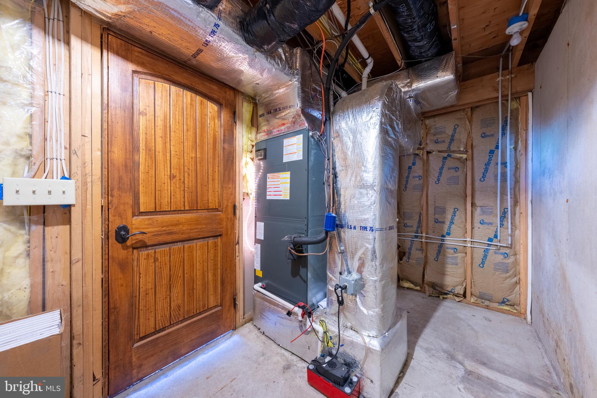 3446 Honeysuckle Road Bethlehem, PA 18015 - Photo 51 of 80 a view of a room with wooden floor and windows
