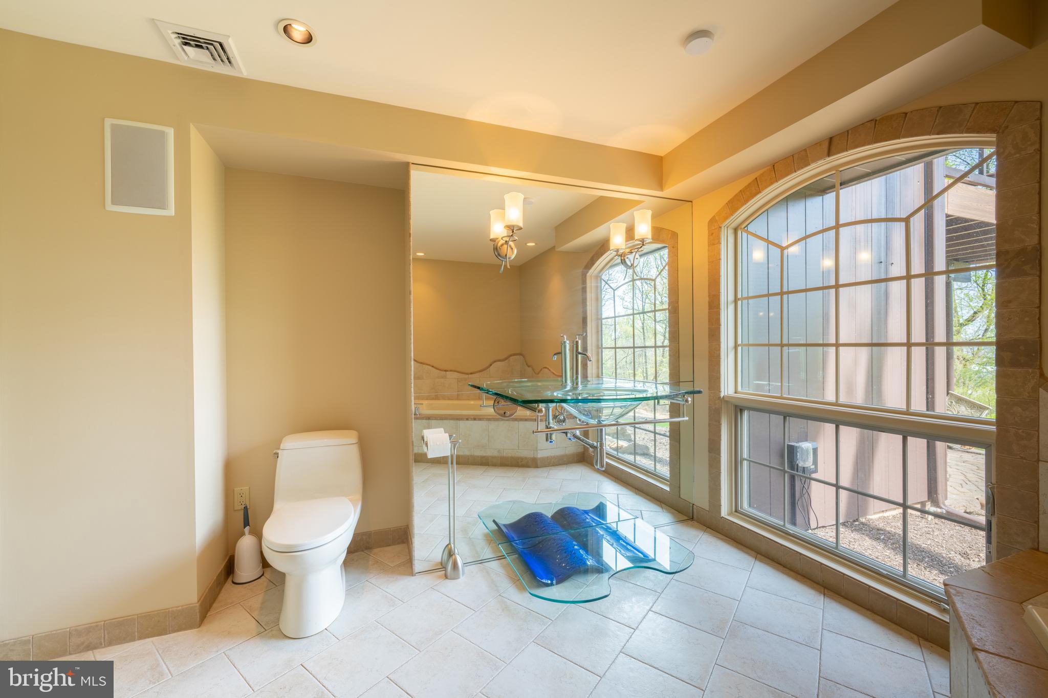 3446 Honeysuckle Road Bethlehem, PA 18015 - Photo 56 of 80 a bathroom with a toilet sink and a shower