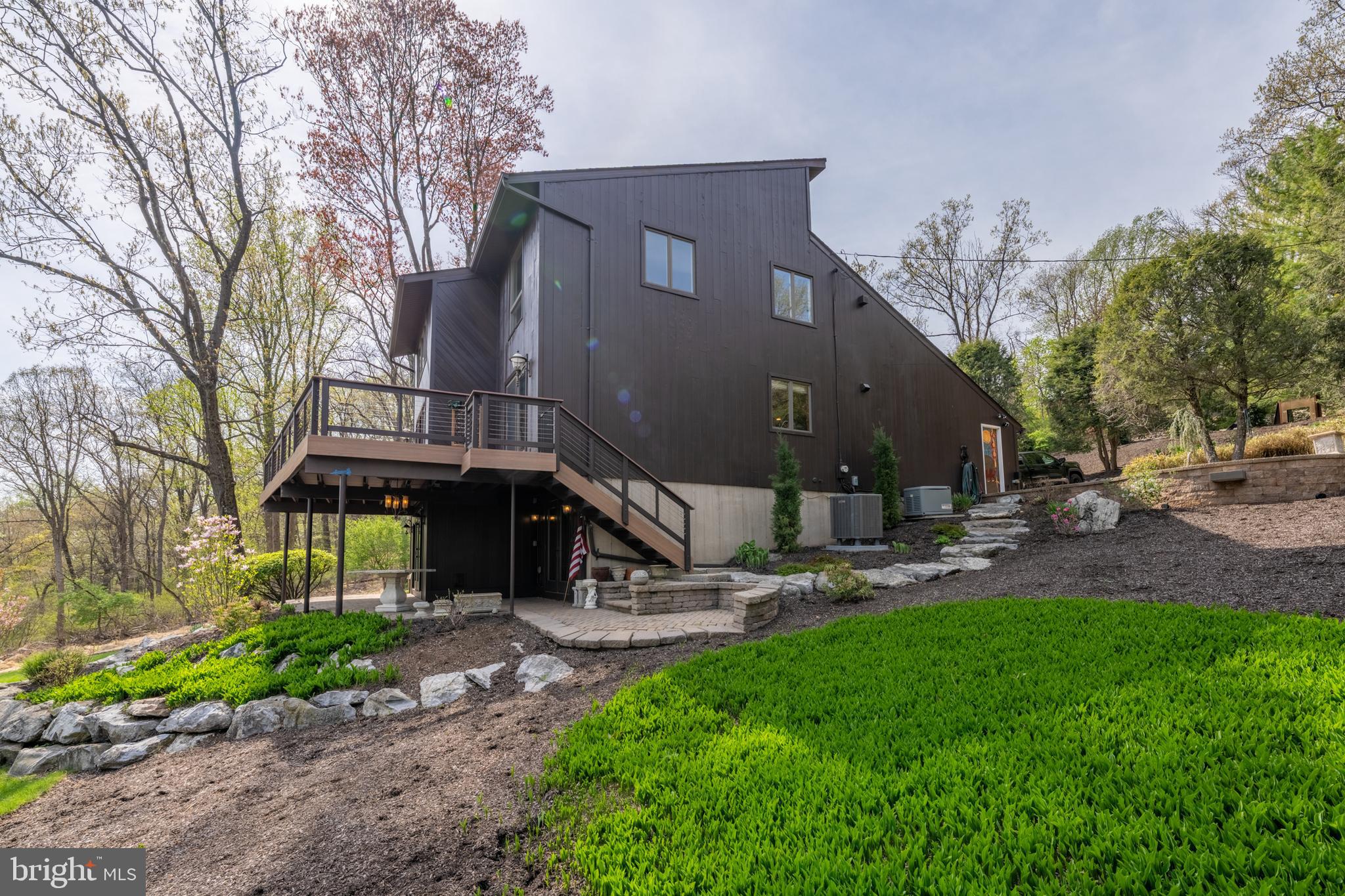 3446 Honeysuckle Road Bethlehem, PA 18015 - Photo 70 of 80 a view of a house with a yard and sitting area