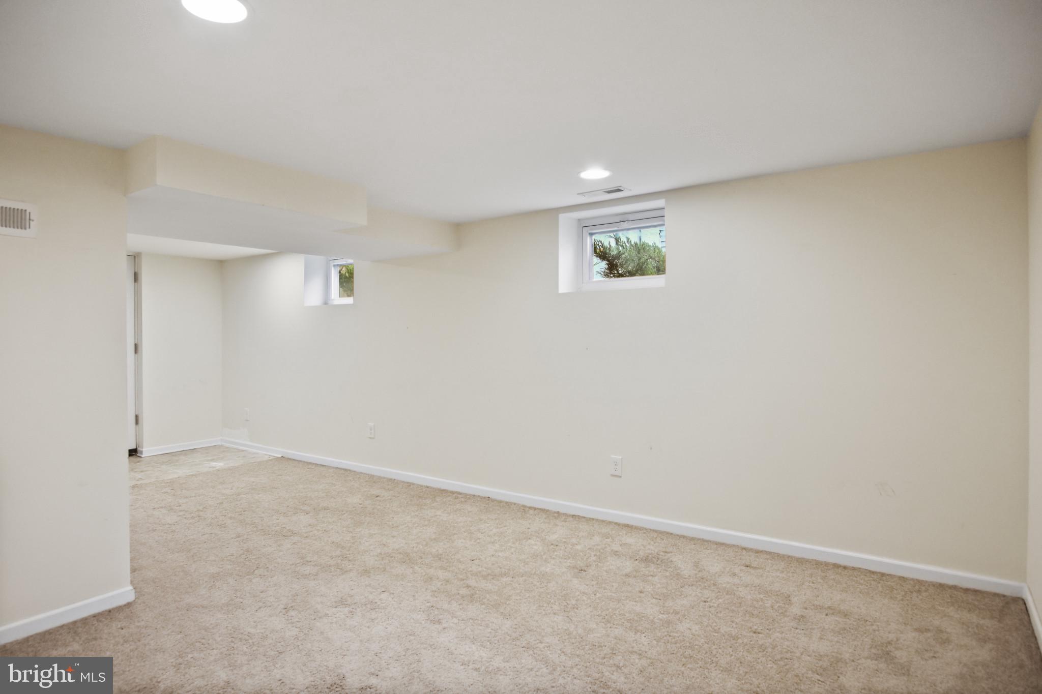 317 Wye Road Essex, MD 21221 - Photo 23 of 35 an empty room with a natural light