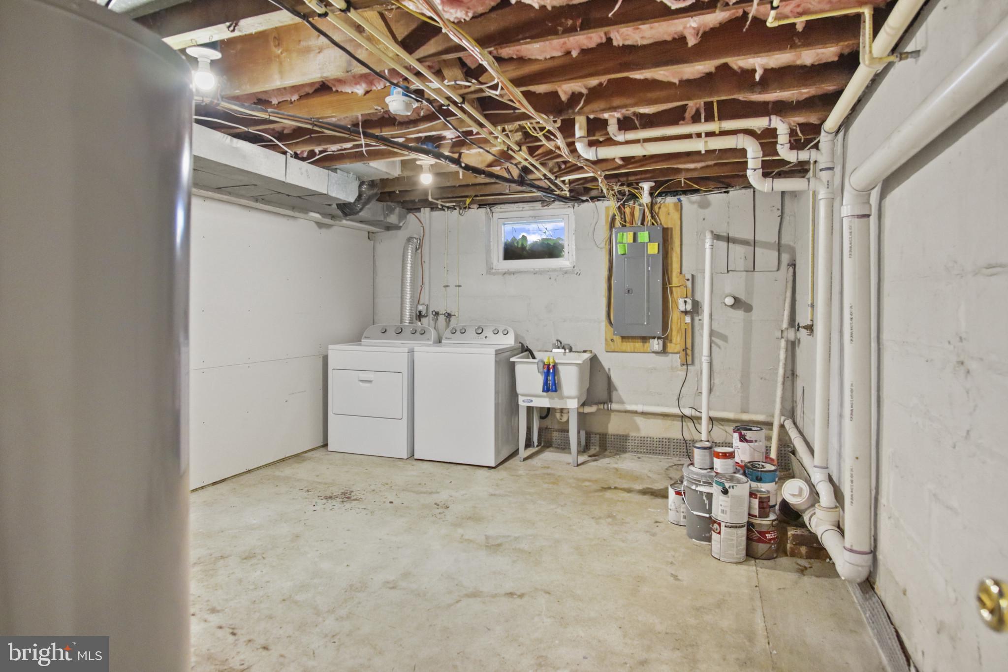 317 Wye Road Essex, MD 21221 - Photo 25 of 35 a utility room with dryer and washer