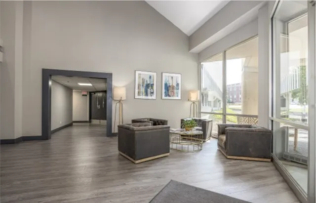 a view of a swimming pool with a yard