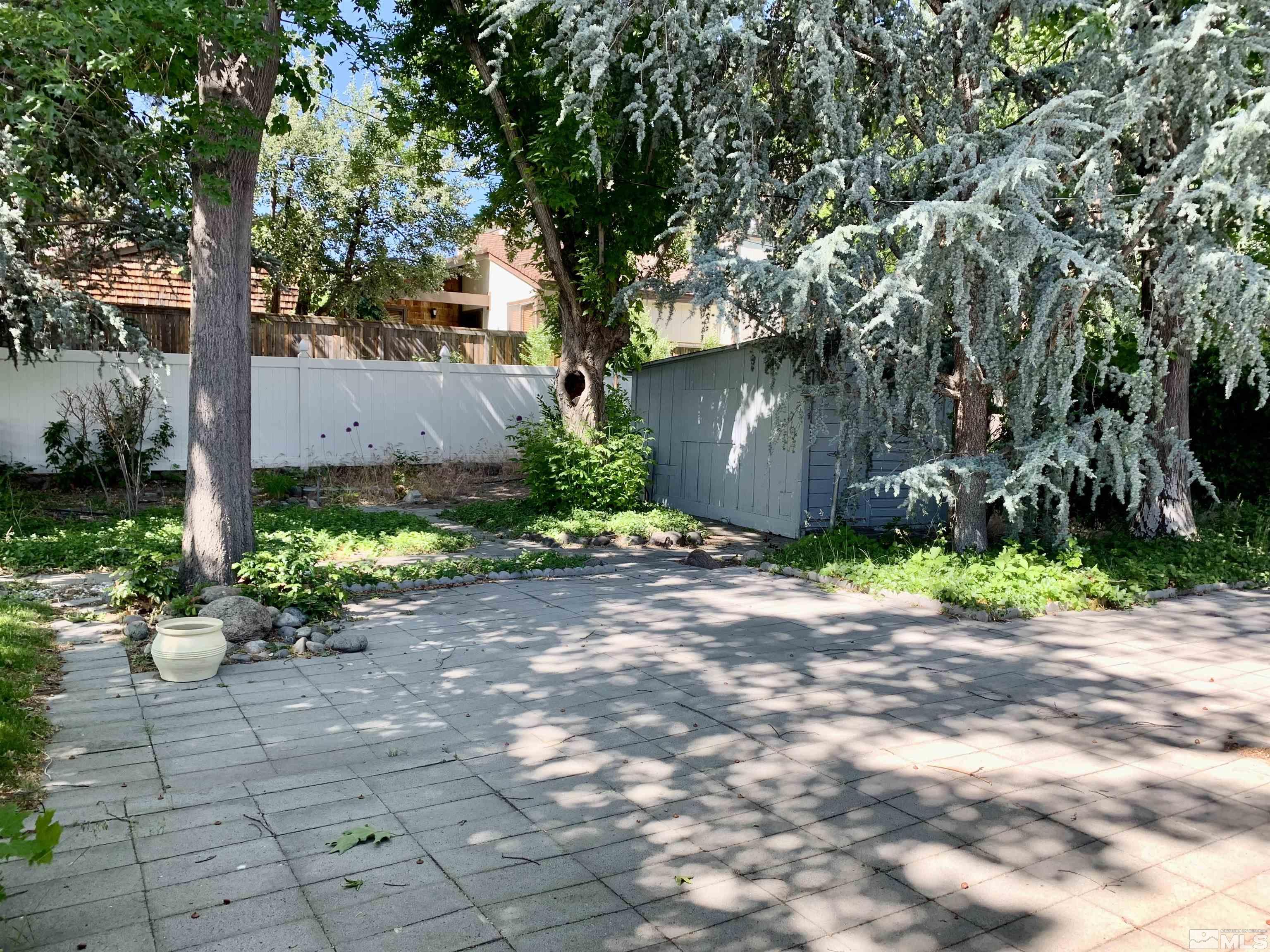 2540 Riviera Street Reno, NV 89509 - Photo 20 of 27 a front view of a house with a yard