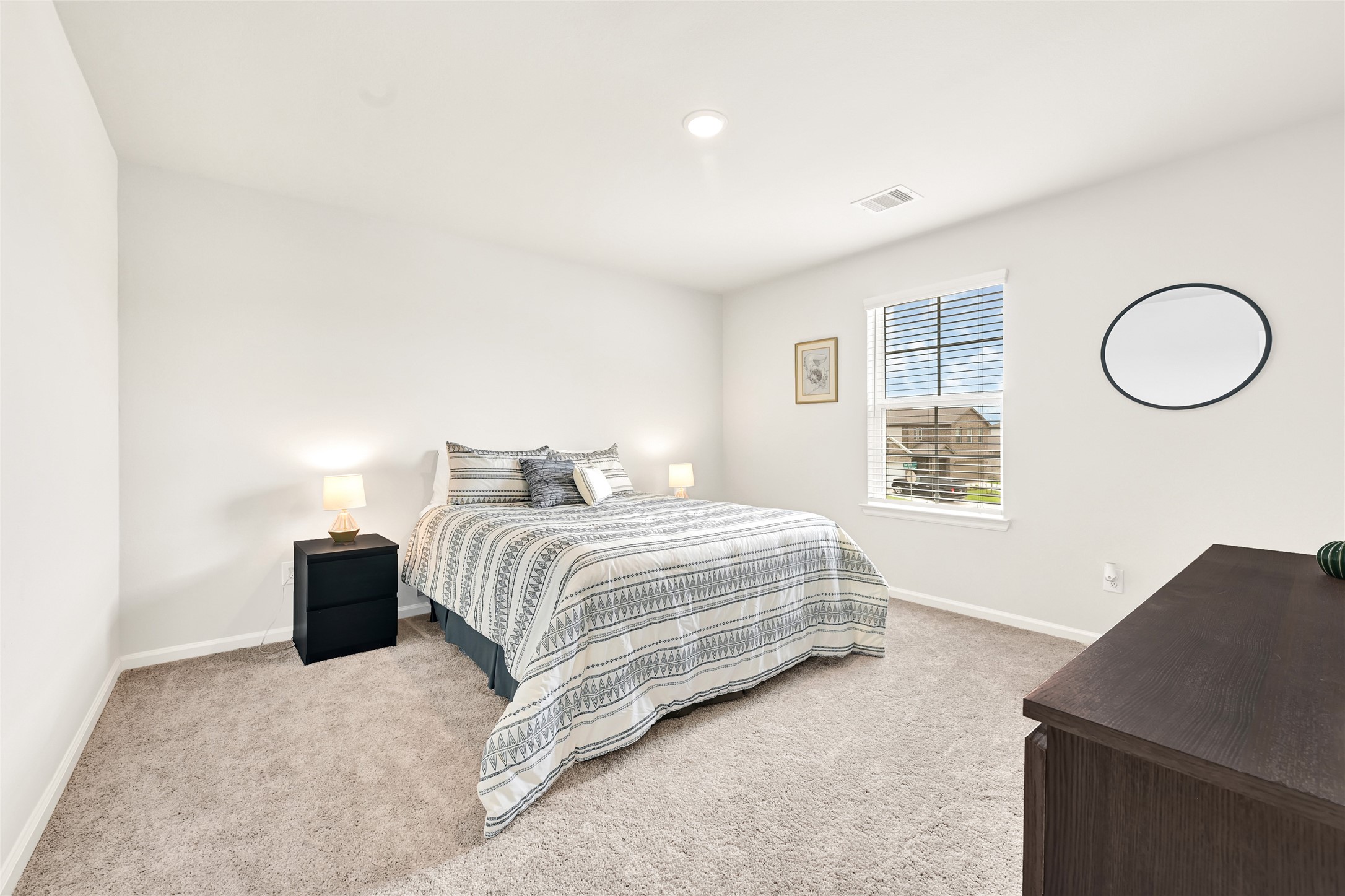 5702 Transformation Trail Katy, TX 77493 - Photo 23 of 32 a bedroom with a bed and a couch