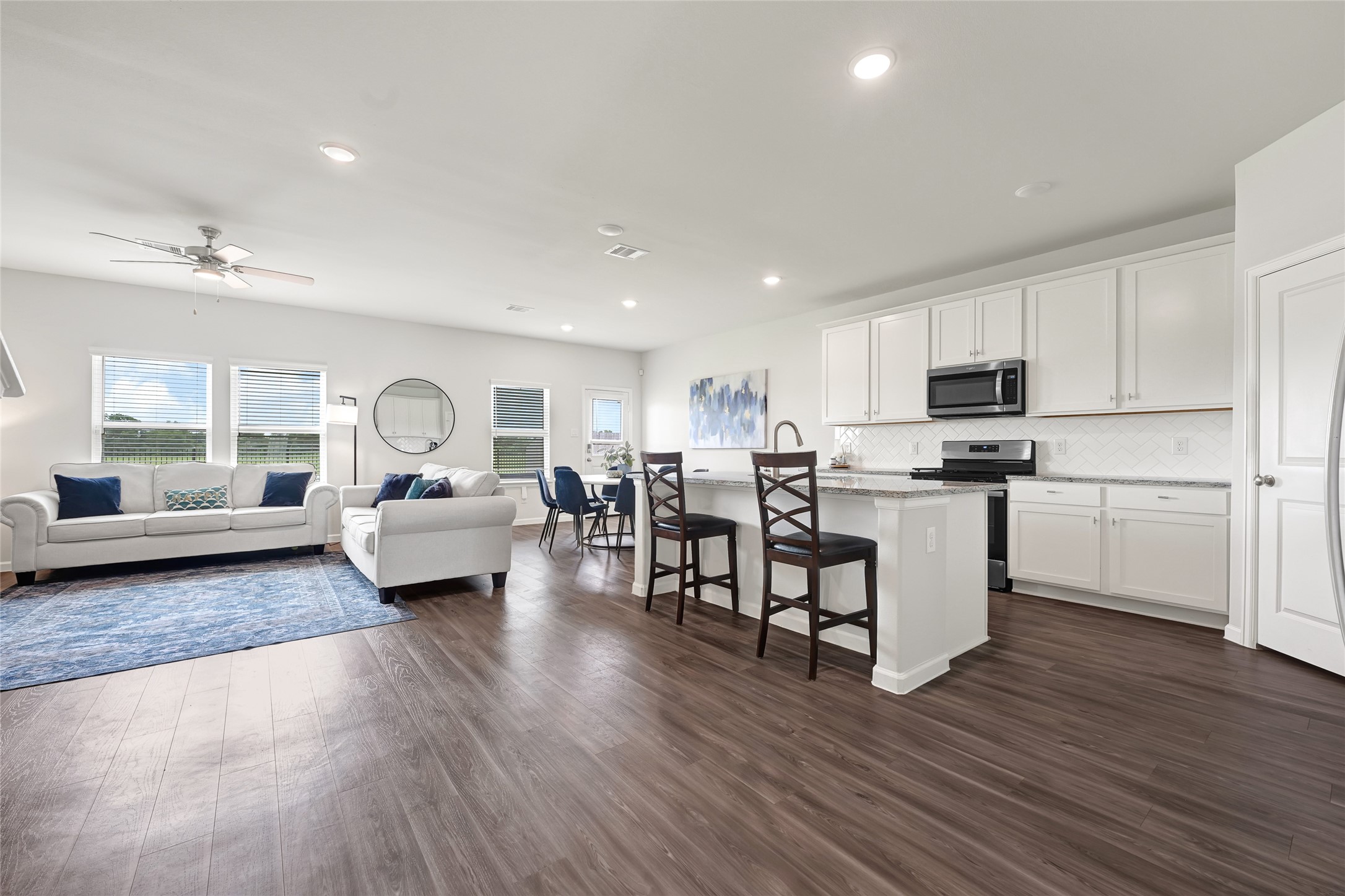 5702 Transformation Trail Katy, TX 77493 - Photo 3 of 32 a living room with furniture and a wooden floor