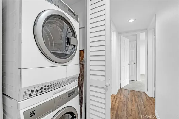 a view of livingroom with washer and dryer