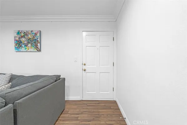 a living room with furniture and a gate