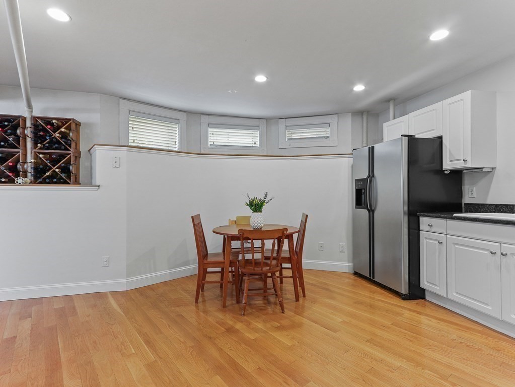 16 Garrison Road, Unit 8 Brookline, MA 02445 - Photo 9 of 20 a view of a dining room with furniture