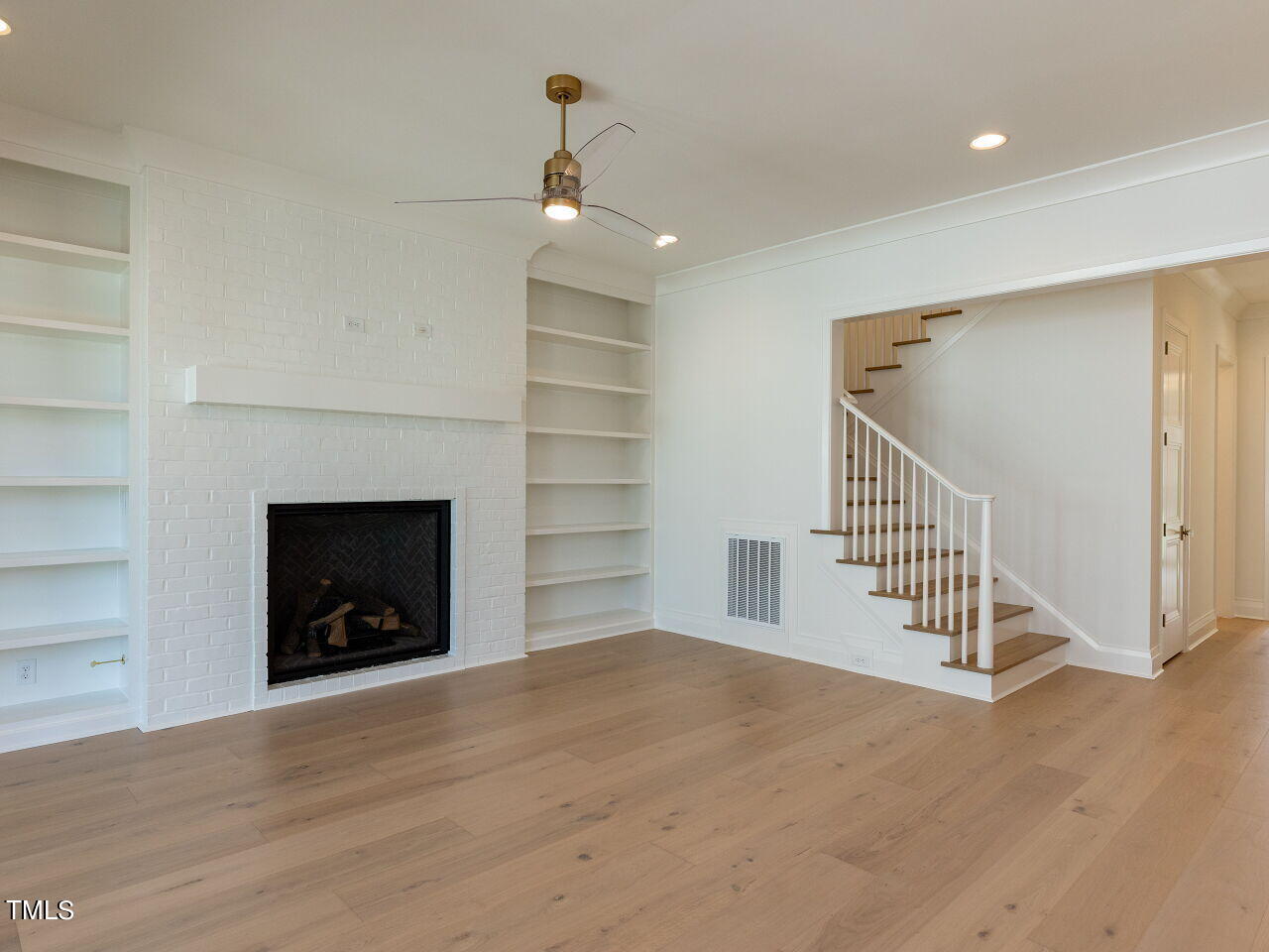 2302 Lyon Street Raleigh, NC 27608 - Photo 16 of 49 012-1280x960-family-room-with-fireplace