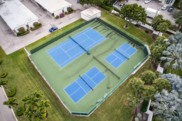 a dining room with furniture and a chandelier