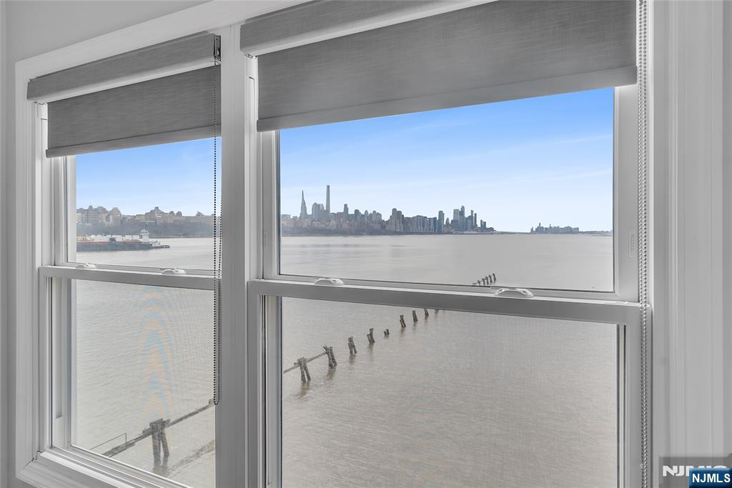 314 The Promenade Edgewater, NJ 07020 - Photo 16 of 37 a view of a balcony with an ocean view