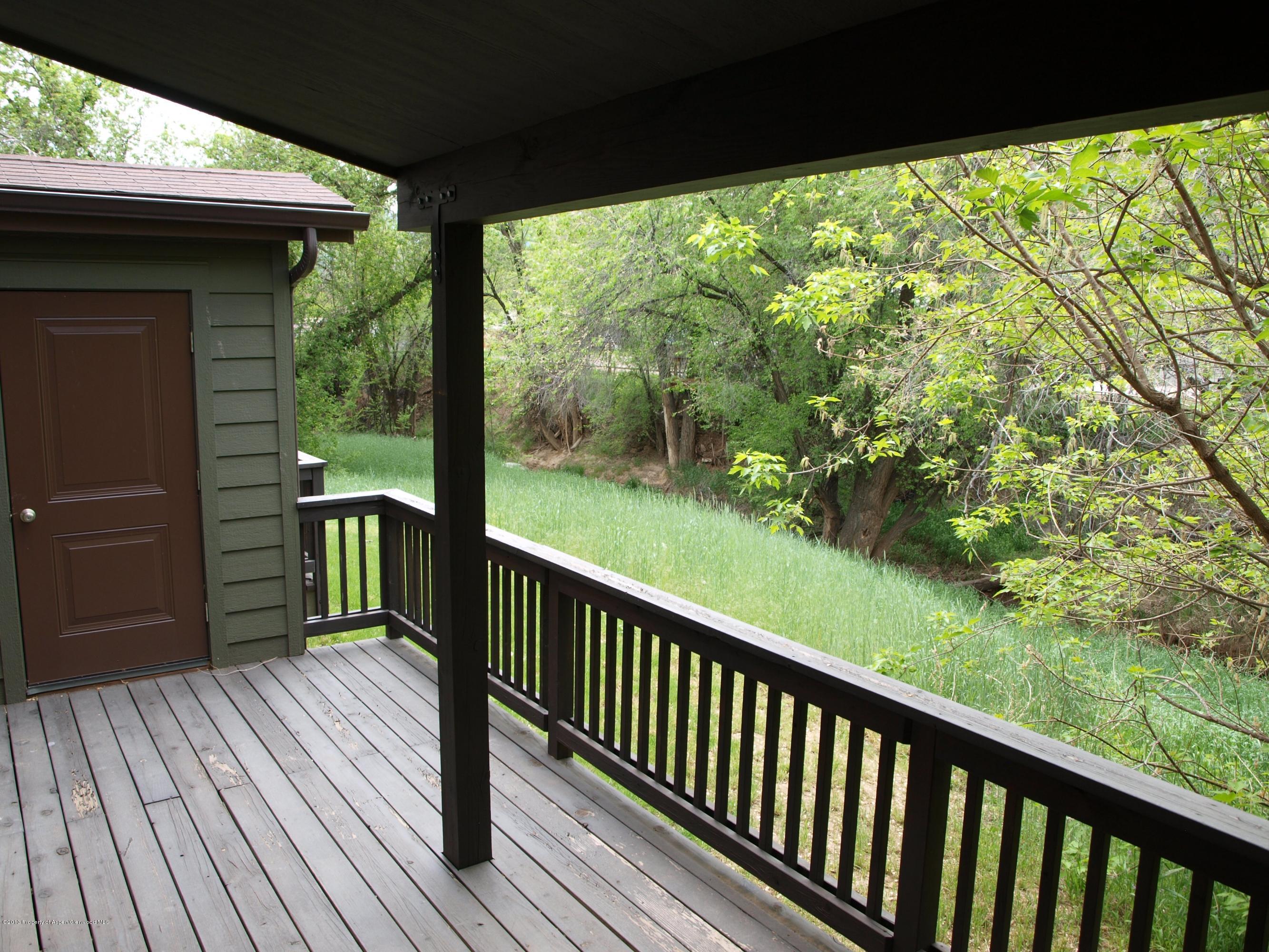 1129 Whiteriver Avenue Rifle, CO 81650 - Photo 9 of 11 deck and creek view