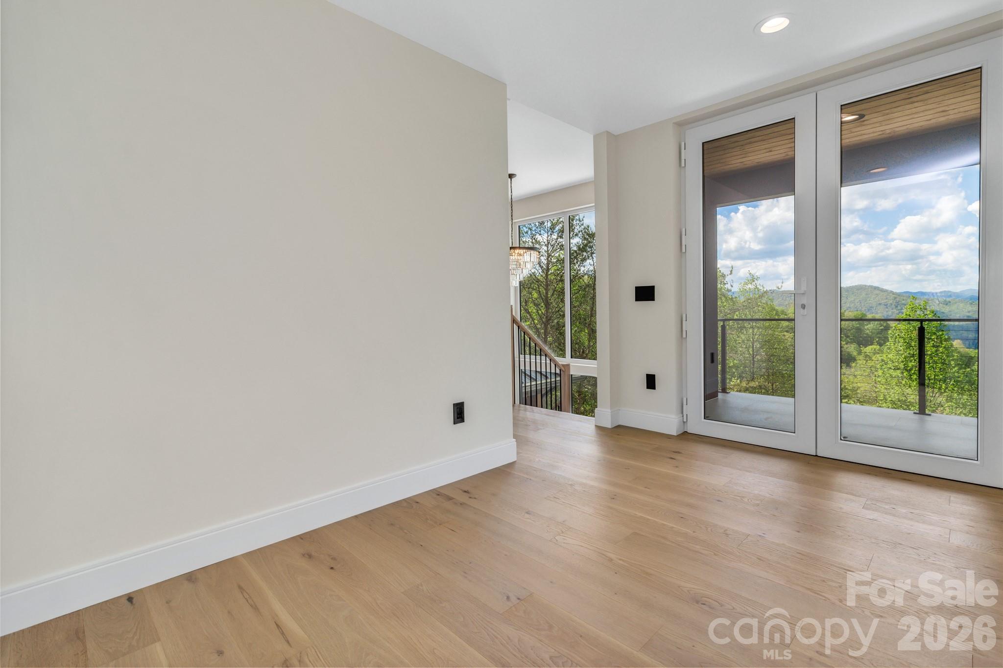 134 View Ridge Parkway Leicester, NC 28748 - Photo 40 of 48 a view of an empty room with a window