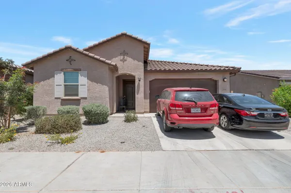 a car parked in front of a house