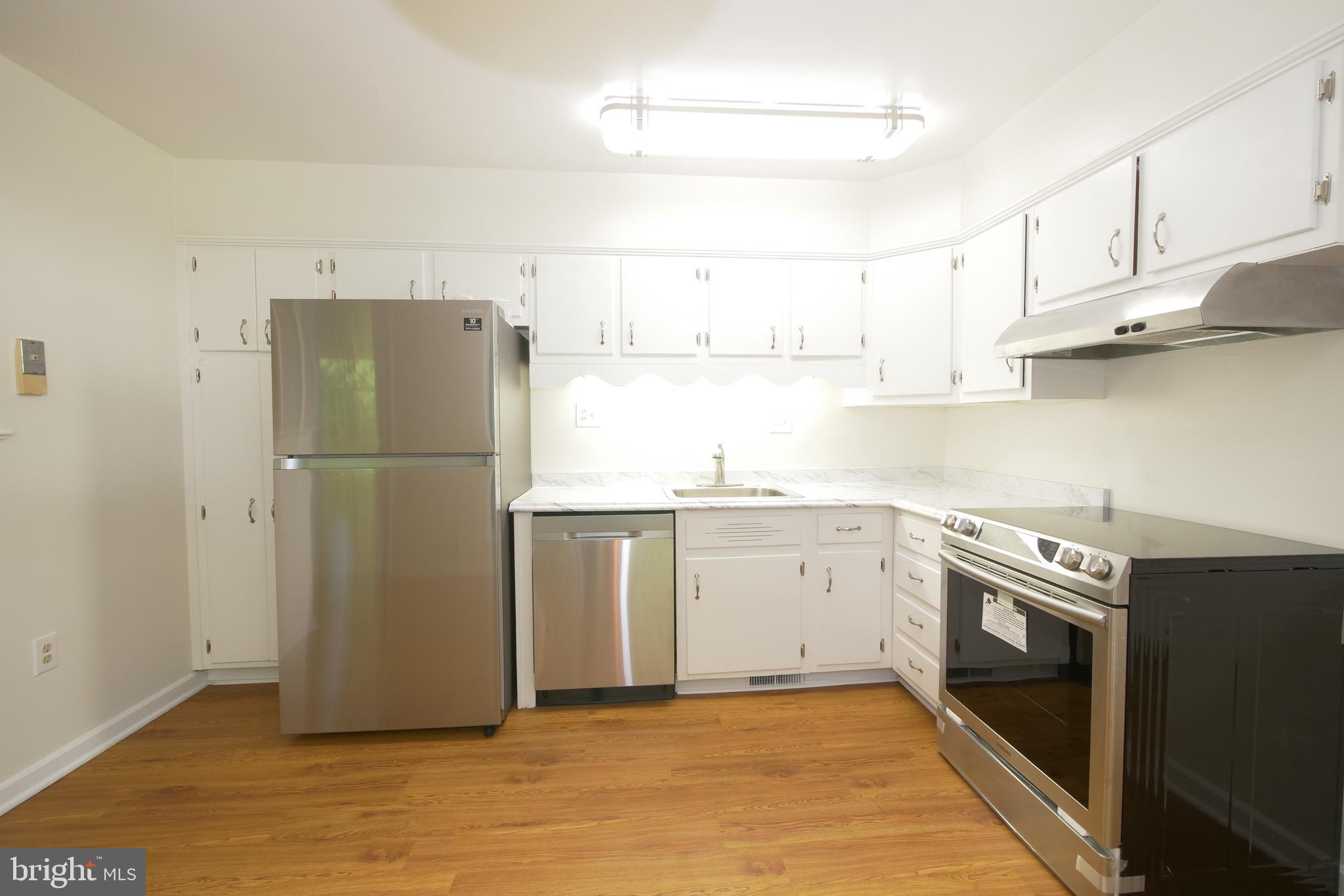 12811 Bluhill Road Silver Spring, MD 20906 - Photo 15 of 32 Lower Level Kitchen