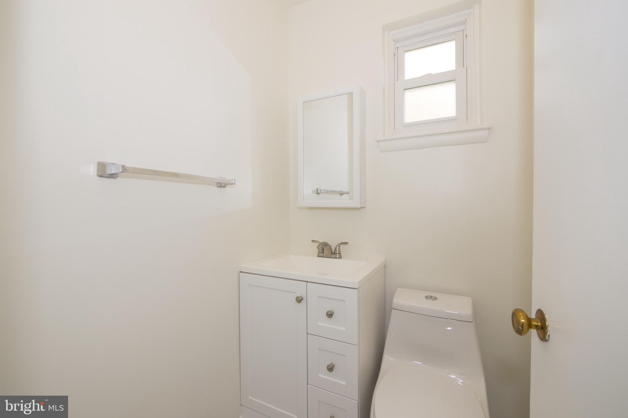 12811 Bluhill Road Silver Spring, MD 20906 - Photo 17 of 32 Lower Level Half Bathroom