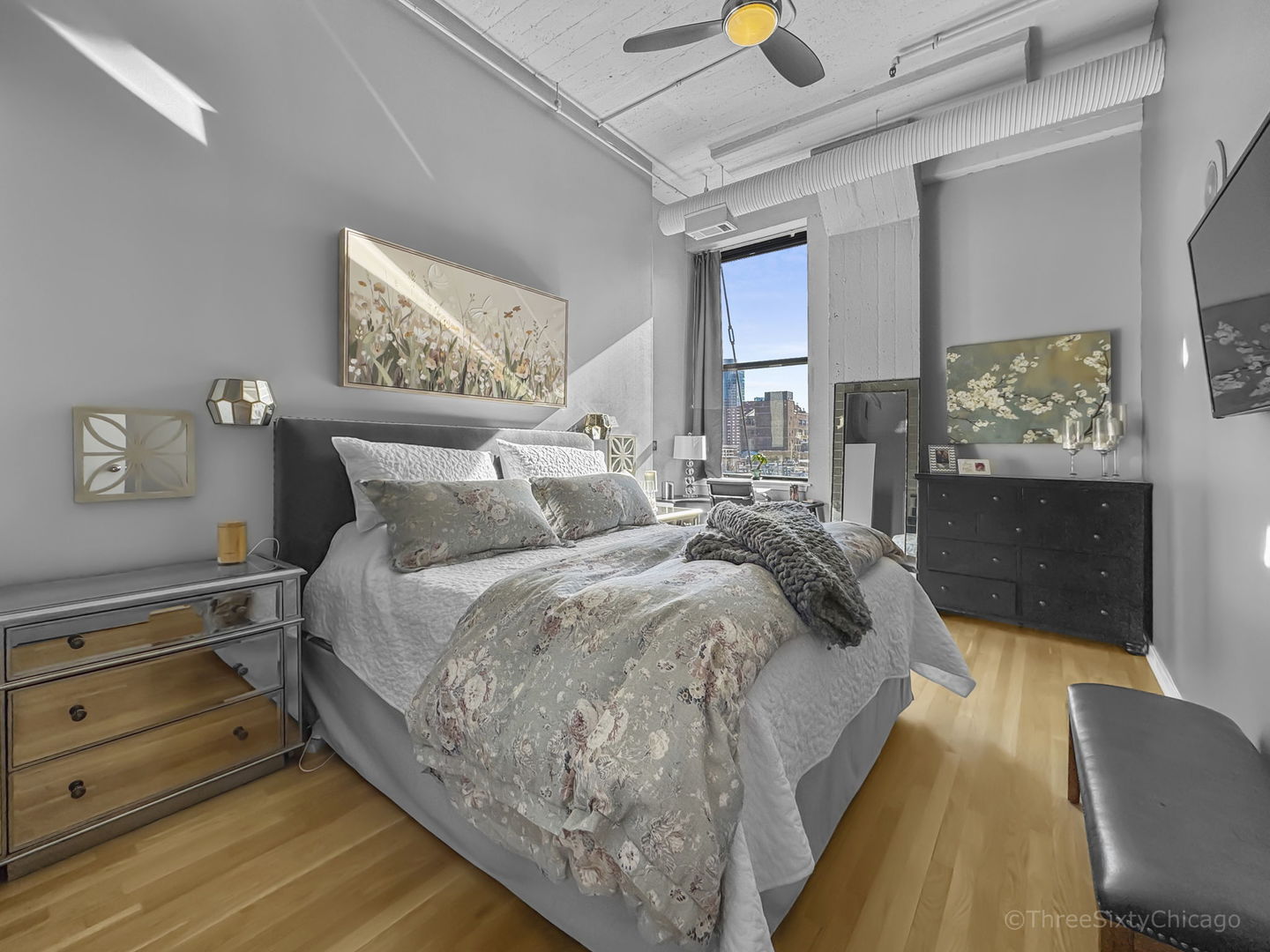 547 South Clark Street, Unit 1002 Chicago, IL 60605 - Photo 15 of 26 a spacious bedroom with a bed and window