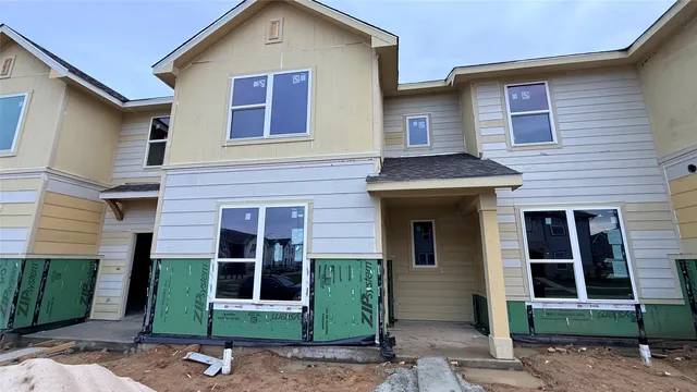 a front view of a house with a garage
