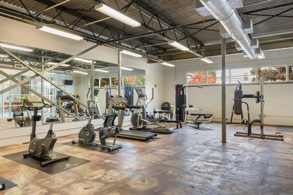 a view of a room with gym equipment