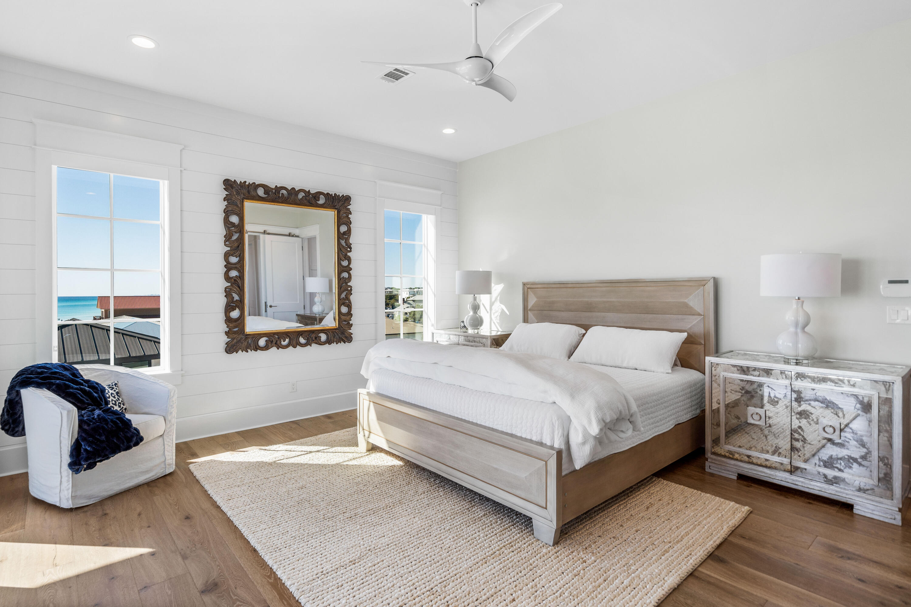 25 Fort Panic Road Santa Rosa Beach, FL 32459 - Photo 17 of 88 a bedroom with a large bed and wooden floor