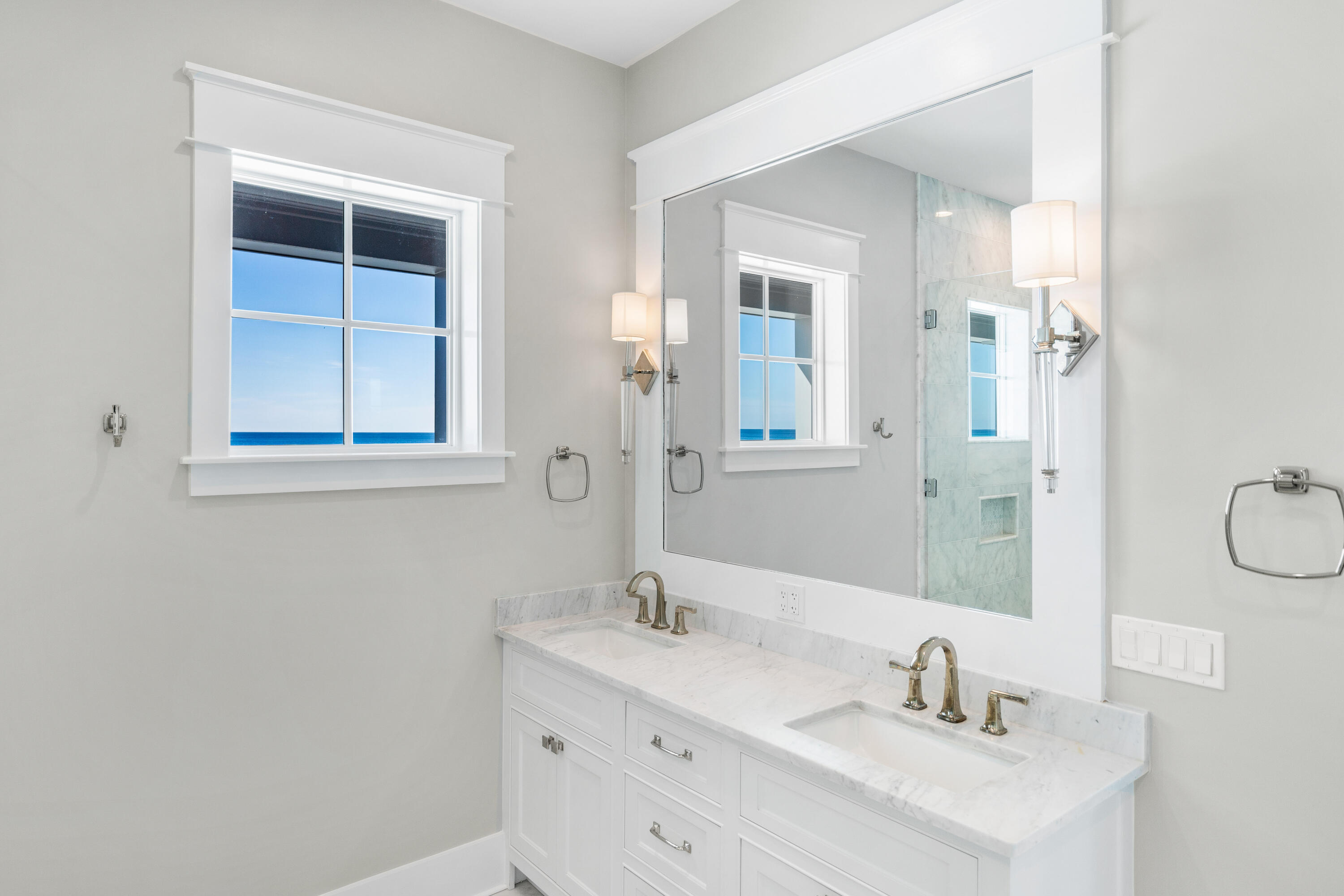 25 Fort Panic Road Santa Rosa Beach, FL 32459 - Photo 24 of 88 a bathroom with a sink and a mirror