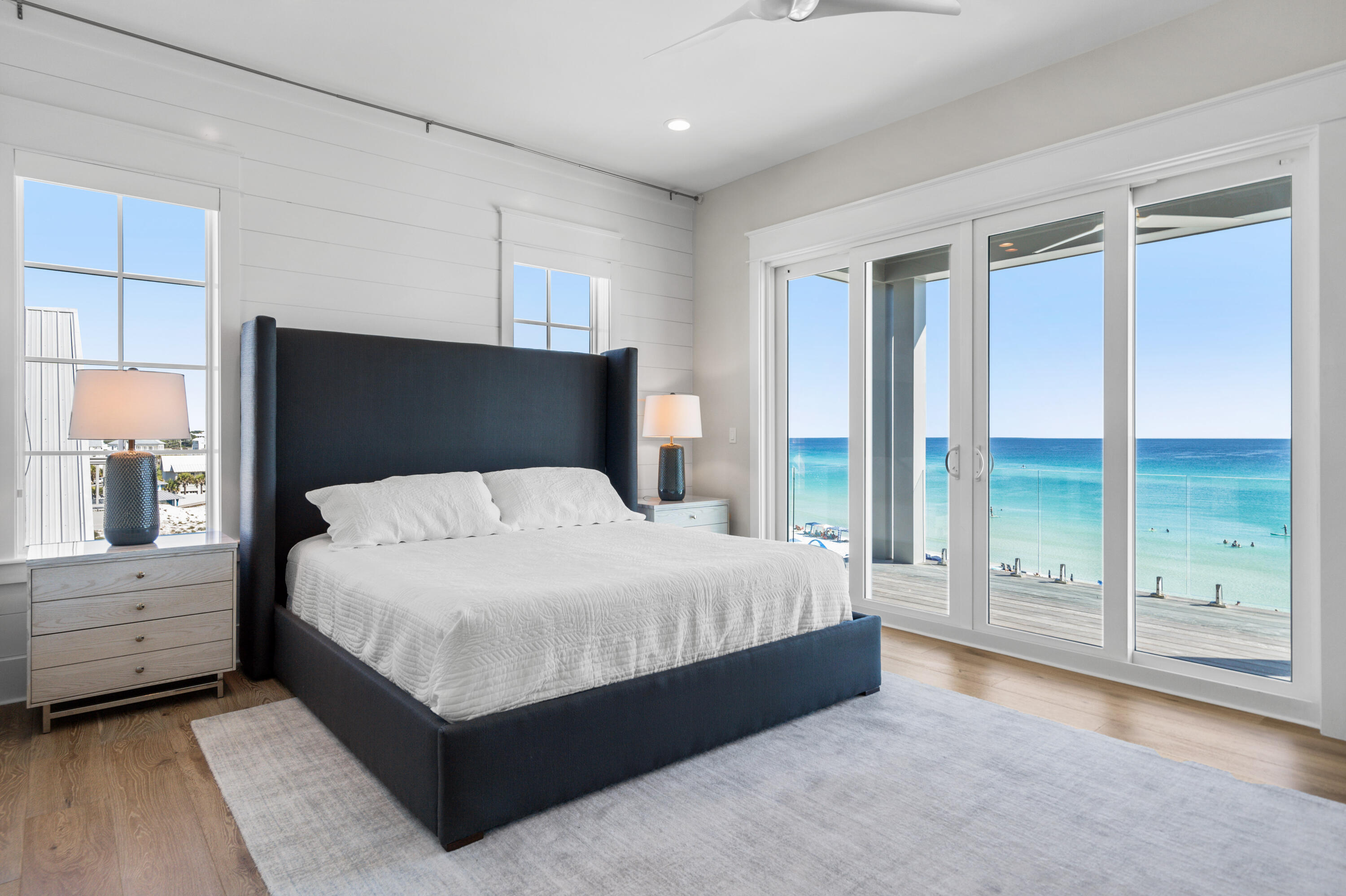25 Fort Panic Road Santa Rosa Beach, FL 32459 - Photo 32 of 88 a bedroom with a large bed and a large window