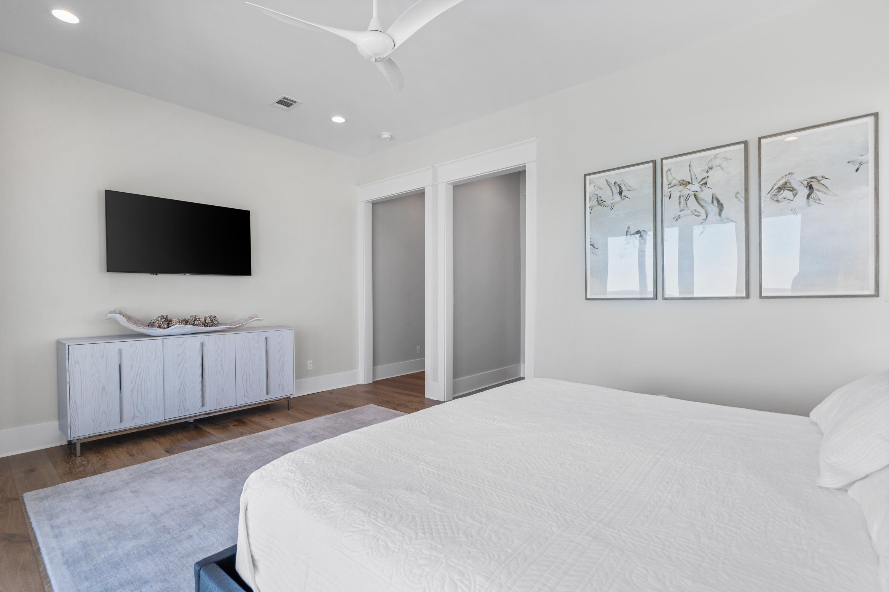 25 Fort Panic Road Santa Rosa Beach, FL 32459 - Photo 34 of 88 a bedroom with a bed and a flat screen television