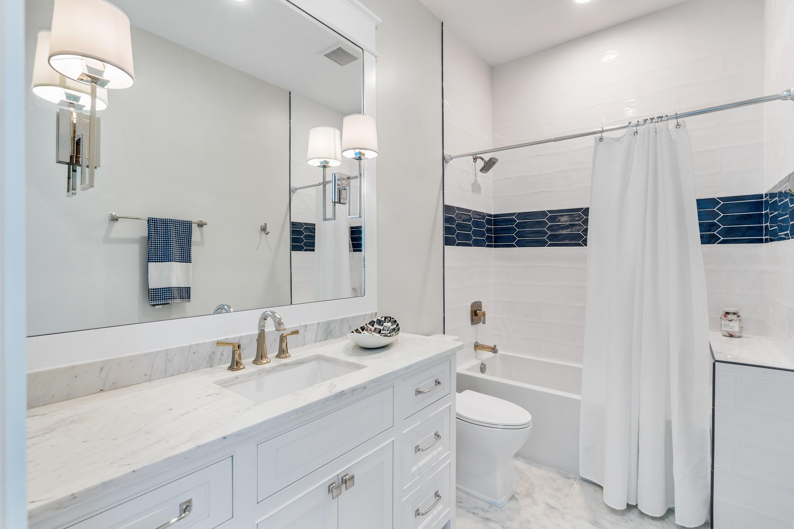 25 Fort Panic Road Santa Rosa Beach, FL 32459 - Photo 47 of 88 a bathroom with a double vanity sink toilet mirror and shower