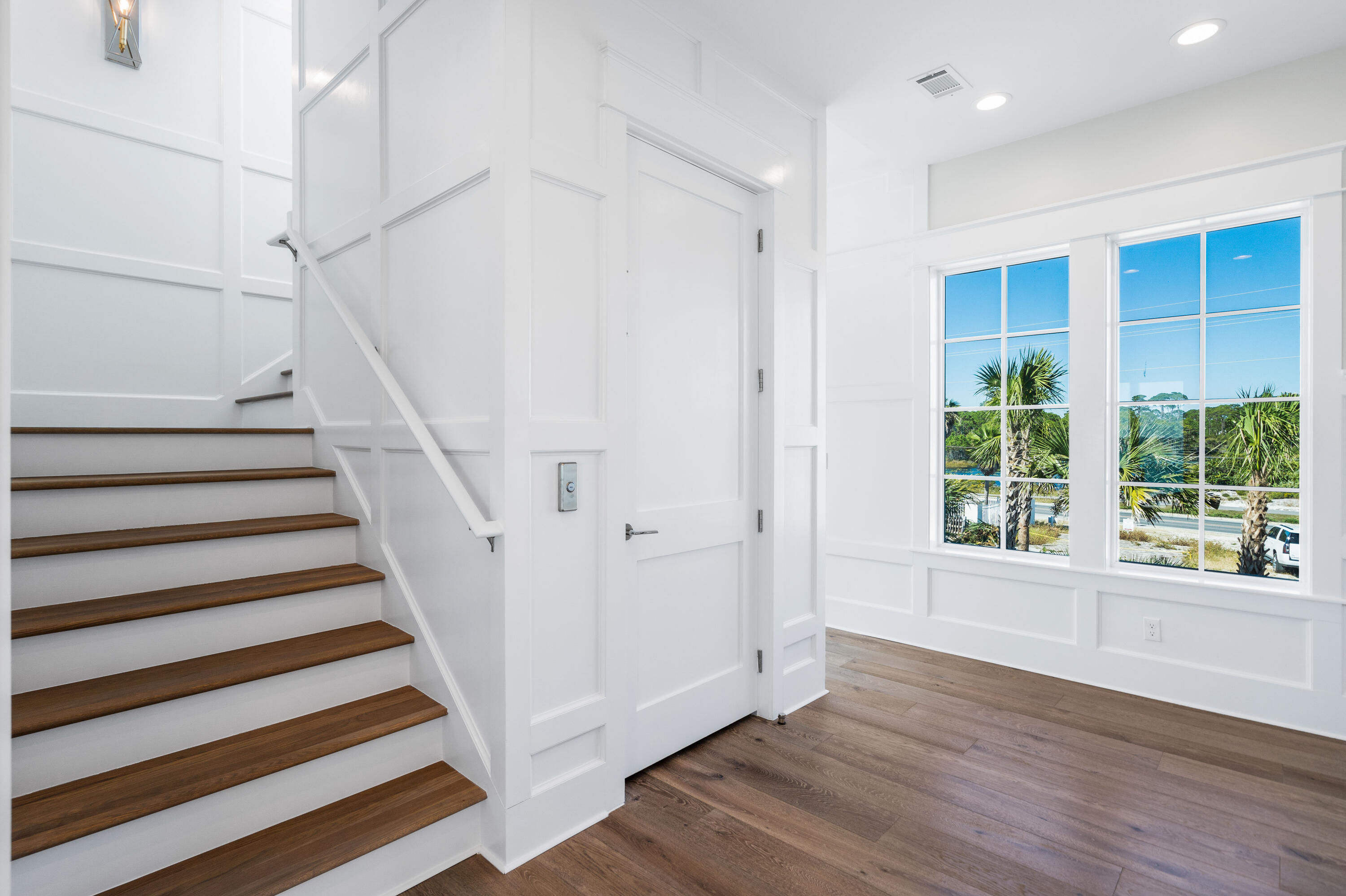 25 Fort Panic Road Santa Rosa Beach, FL 32459 - Photo 51 of 88 a view of entryway with wooden floor and stairs