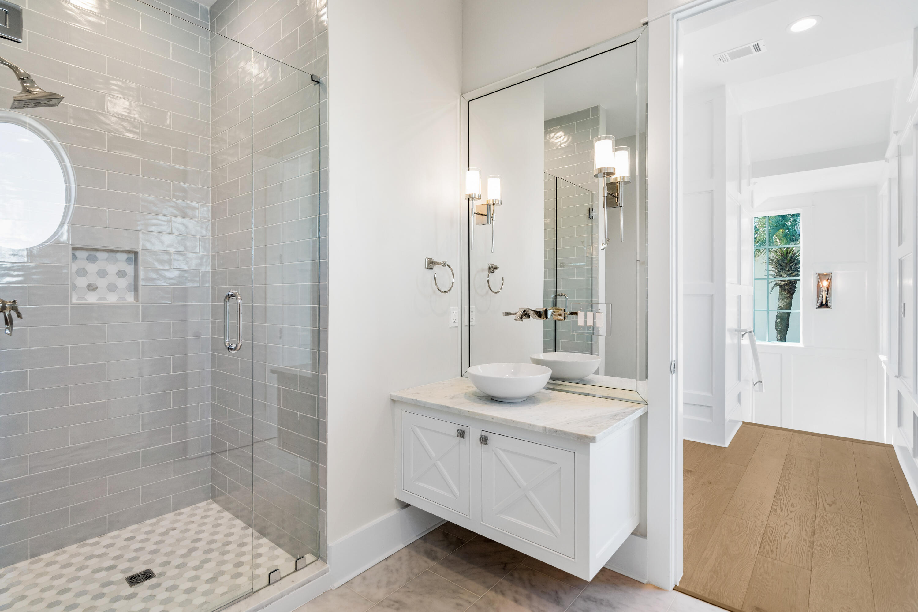 25 Fort Panic Road Santa Rosa Beach, FL 32459 - Photo 55 of 88 a bathroom with a double vanity sink a mirror and a shower