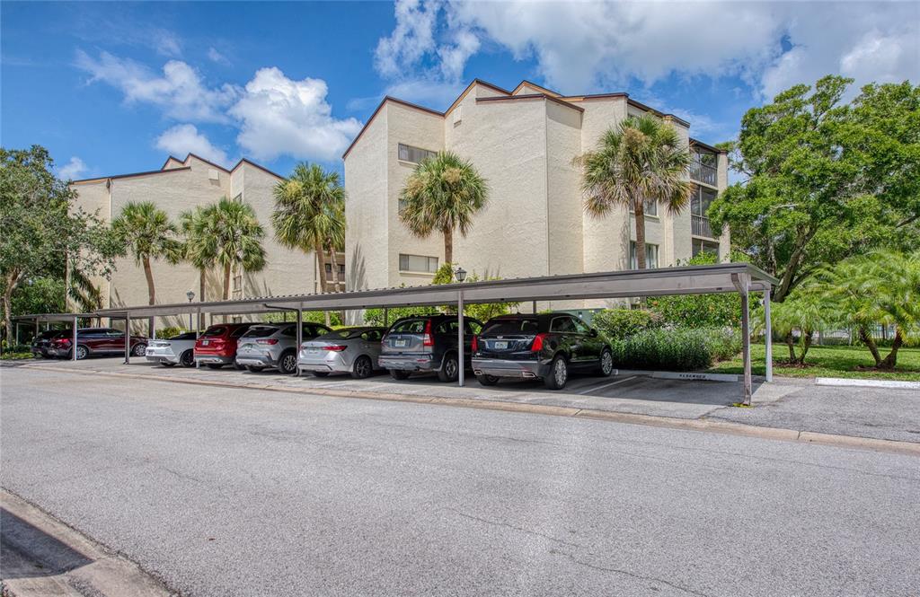 700 Starkey Road, Unit 1145 Largo, FL 33771 - Photo 56 of 63 an outdoor view of a building with garage